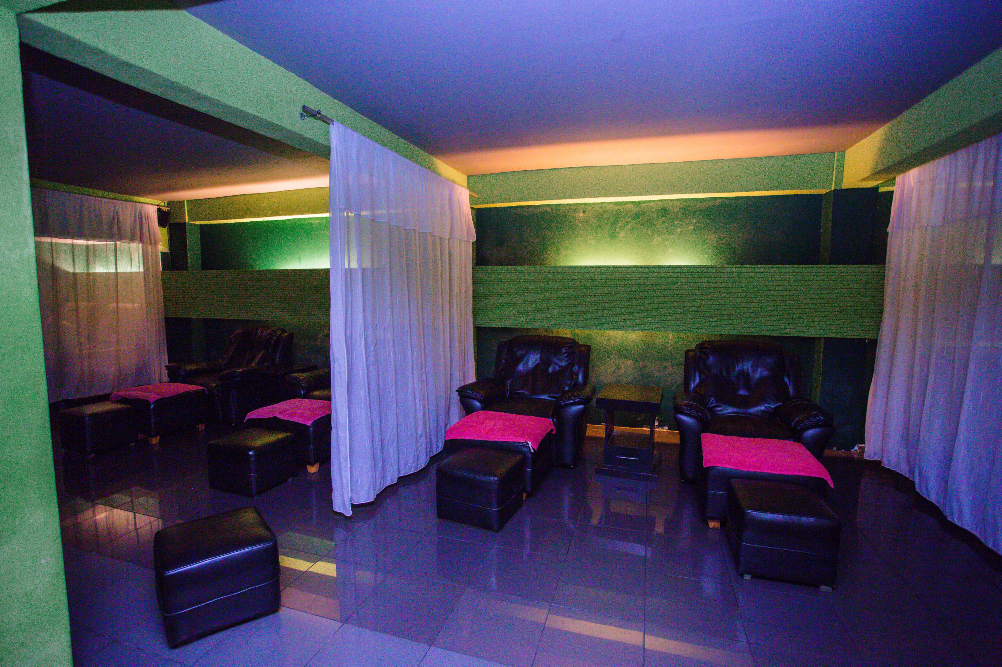 Reflexology room with purple lighting